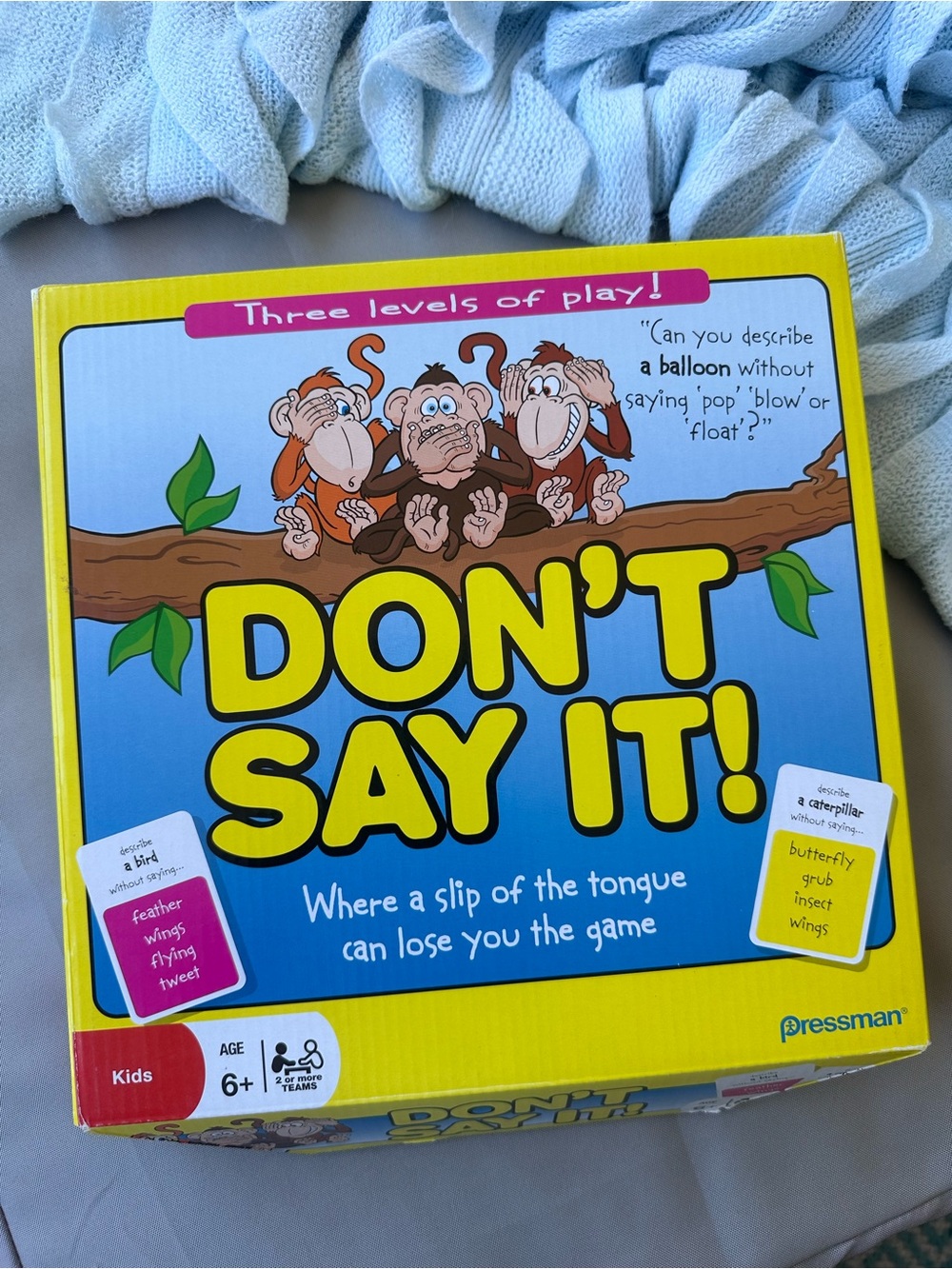 Don't Say It! Family Party Game - Yellow & Blue Box